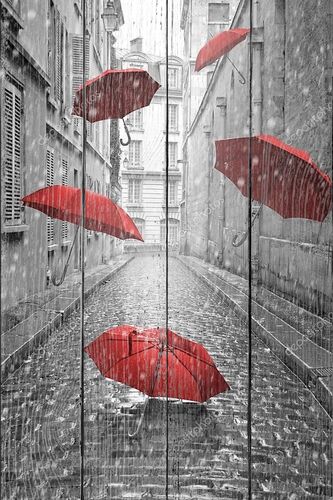 Красные зонтики парящие над улицей