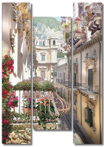 Узкая улочка с цветочными балконами