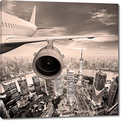 Самолет и вид на город с высоты