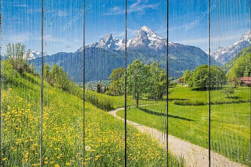 Идиллический весенний пейзаж в Альпах с лугами