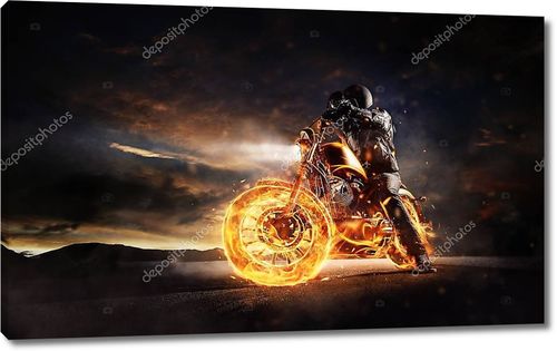 Горящий мотоцикл в лучах заката