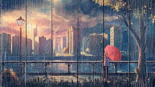 Девушка с зонтом на набережной