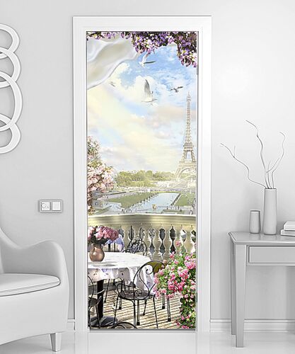 Вид на Париж с цветущего балкона со столиком