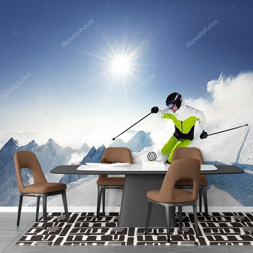 Лыжник в горах на трассе