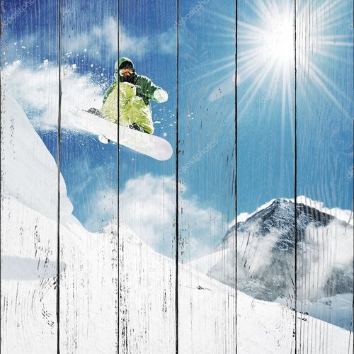 Сноубордист при прыжках в горы
