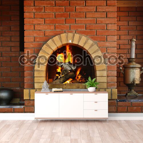 Кухня с камином и горящий огонь